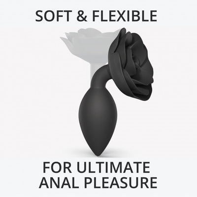 Black silicone anal plug with a rose-shaped base, highlighted as soft and flexible for ultimate comfort.