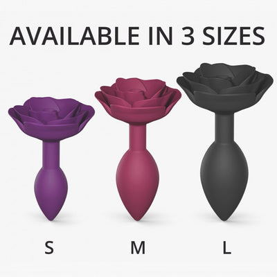 Three rose-shaped anal plugs in small purple, medium plum, and large black sizes displayed on a white background.