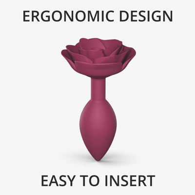 Medium plum-colored anal plug with a rose-shaped base, ergonomic design for easy insertion and comfort.