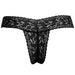 Black lace G-string panty with floral pattern and scalloped edges, designed for discreet wearable pleasure device.