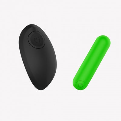 Black wireless remote control and green compact bullet vibrator with power buttons on white background