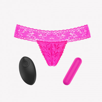 Pink lace G-string panty with a compact pink bullet vibrator and black wireless remote control.