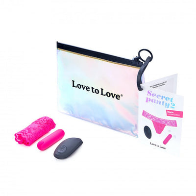 Love To Love Secret Panty 2 set with pink lace panty, compact vibrator, wireless remote, instruction booklet, and iridescent storage pouch.