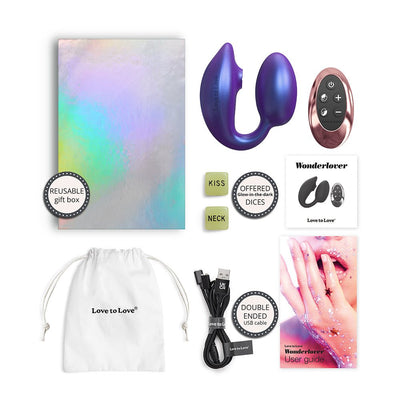 Love To Love Wonderlover set with purple flexible toy, rose gold remote, glow-in-the-dark dice, USB cable, user guide, pouch, and gift box.