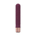Compact plum-colored ribbed mini vibrator with rose gold base, made from smooth silicone for comfortable use.