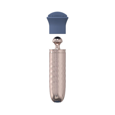 Rose gold textured rechargeable wand vibrator with detachable blue silicone brush head attachment.