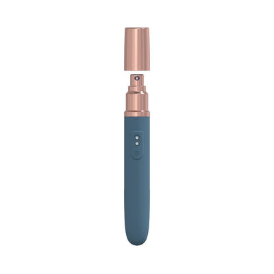 Loveline The Traveler rechargeable travel vibrator with blue silicone body and rose gold cap removed, showing spray nozzle design.