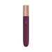 Slim rechargeable travel vibrator in deep plum with rose gold cap and dual-button control panel