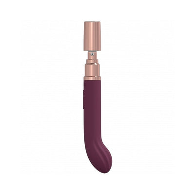 Loveline Traveler G-spot vibrator in deep purple with rose gold cap, sleek curved design, and smooth silicone finish.