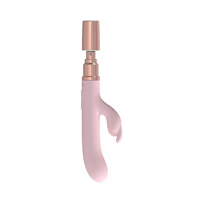 Pink silicone Loveline Traveler Rabbit vibrator with rose gold cap removed, showing sleek ergonomic design.
