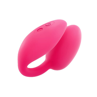 Pink dual stimulator with smooth silicone texture and control buttons on top, designed for versatile use.