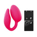 Pink dual stimulator with curved design and wireless black remote control with four buttons.