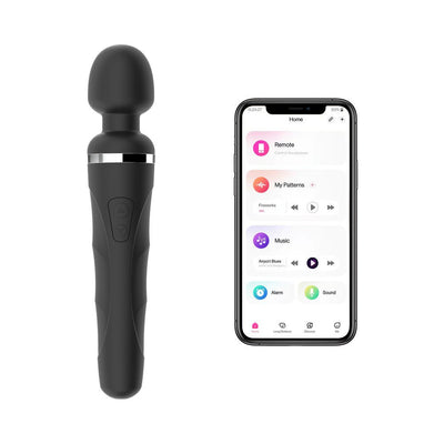 Black Lovense Domi 2 wand vibrator next to smartphone displaying its app control interface.