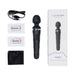 Lovense Domi 2 black wand vibrator with USB charging cable, user manuals, storage pouch, and packaging box on white background.