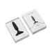 Lovense Hush 2 black silicone butt plug displayed in white packaging with product box beside it on white background.