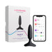 Lovense Hush 2 black silicone butt plug with flared base next to its packaging and smartphone showing app control interface.