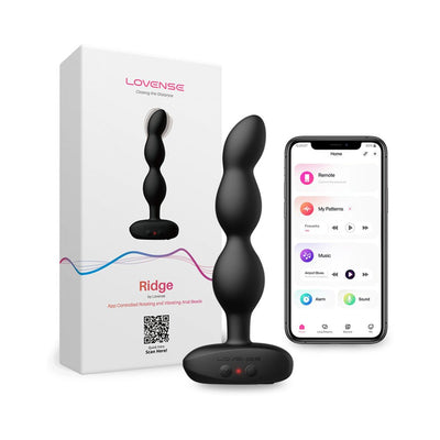Black Lovense Ridge vibrating and rotating anal beads with app control displayed next to its packaging and smartphone interface.