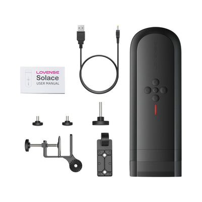 Lovense Solace automatic male masturbator with USB charging cable, adjustable desk mount, and user manual laid out on white background.