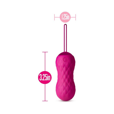 Pink textured insertable bullet vibrator with pull loop, measuring 3.25 inches long and 1.25 inches wide.