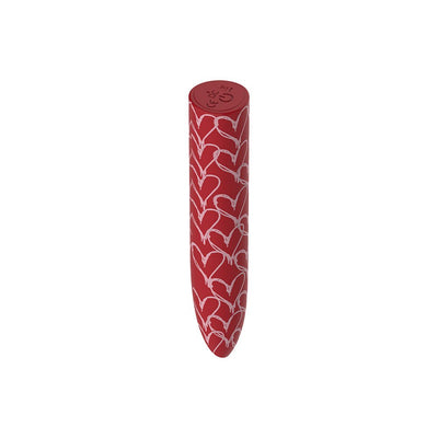 Red bullet vibrator with white heart patterns and a single button on top against a white background.
