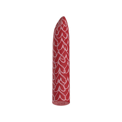 Red bullet vibrator with white heart patterns and a smooth, tapered tip.