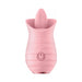 Compact pink silicone vibrator with a tongue-shaped flickering tip and textured body, featuring a power button on the front.