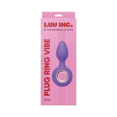 Purple silicone vibrating plug with a rose gold ring, displayed on pink Luv Inc packaging.