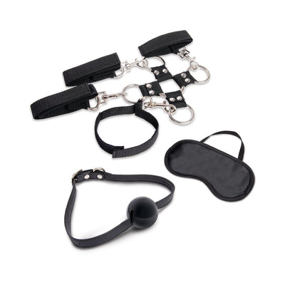 Lux Fetish 7-piece bondage kit with adjustable black cuffs, hogtie connector, ball gag, and satin blindfold on white background.