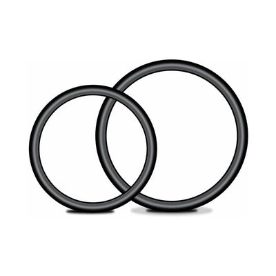 Two black rubber holder rings for strap on harness accessories in different sizes on white background