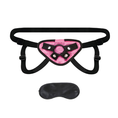 Black and pink neoprene strap-on harness with adjustable straps and included black blindfold.