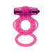 Magenta Magna Man vibrating cock ring with textured design and dual loops for enhanced stimulation and support.