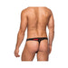 Rear view of a man wearing a black micro thong with red lips print and a low-rise waistband.