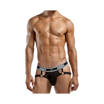 Male model wearing black Peep Show jock strap with decorative metal rings and branded elastic waistband.