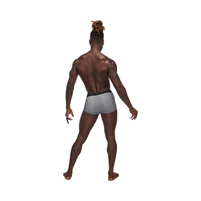 Rear view of a man wearing gray Male Power Sexagon Mini Shorts with a black branded waistband on a white background.