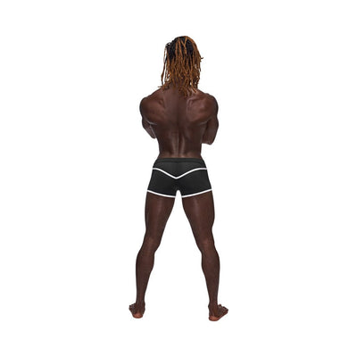 Rear view of a man wearing black Male Power Sport Mesh Mini Shorts with white trim and sporty detailing.