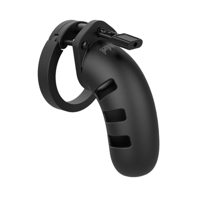 Black silicone Man Cage Model 17 chastity device with ventilation slots and a secure locking mechanism.