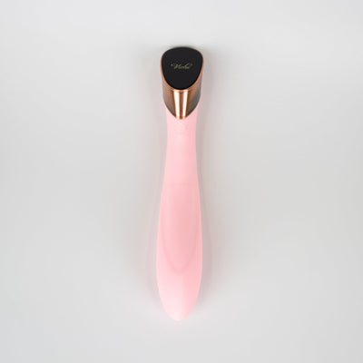 Sleek pink silicone G-spot vibrator with rose gold and black touch panel control, designed for ergonomic comfort and easy use.