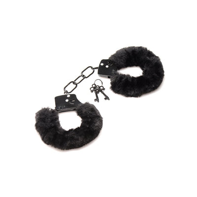 Black furry handcuffs with soft faux fur lining and metal chain, including two small keys on a white background.