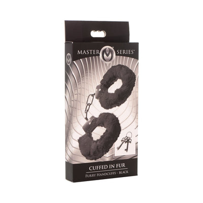 Packaging box of Master Series black furry handcuffs with two metal keys shown on front design.