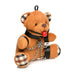Plush brown teddy bear keychain with plaid ears and paws, wearing black faux leather straps, chains, and a red ball gag accessory.