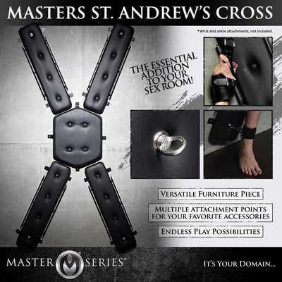 Black padded Masters St. Andrew's Cross with multiple attachment points for cuffs and accessories, shown mounted on wall.