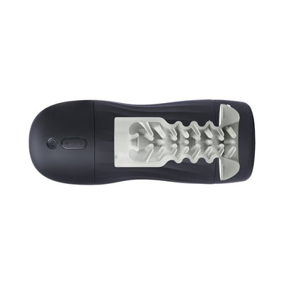 Top view of Maxtasy Stroke Master Standard male pleasure device with textured internal sleeve and control buttons.