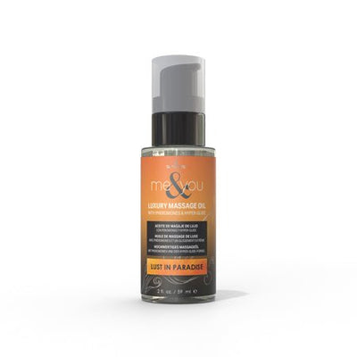 Bottle of Me and You Luxury Massage Oil 2oz with orange label and black pump dispenser on white background.