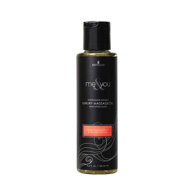Bottle of Me & You luxury massage oil with wild passionfruit and island guava scent, 4.2 oz size with black label and flip cap.