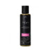Bottle of Me & You pheromone-infused luxury massage oil with pomegranate, fig, coconut, and plumeria scent, 4.2oz size.
