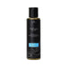 Bottle of Me & You luxury massage oil with vanilla, sugar, and sweet pea scent in sleek black packaging.