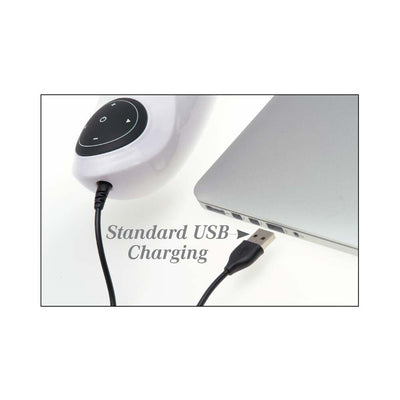 Close-up of a rechargeable device connected to a laptop via standard USB charging cable.