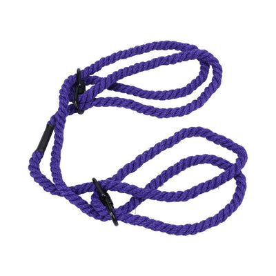 Purple 6mm hemp wrist and ankle cuffs with black slip-ring hardware for easy restraint.