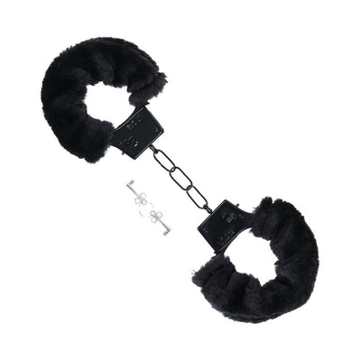 Black metal handcuffs with soft black faux fur lining and two small silver keys on a white background.
