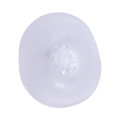 Top view of a frosted translucent extender with textured inner ring and ball strap opening.